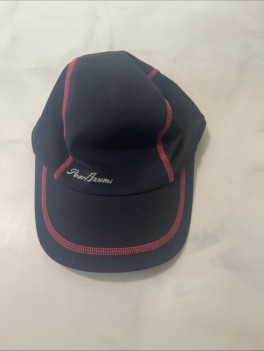 Pearl Izumi Black Swim/Run/ Bike Cap with Red Stitching